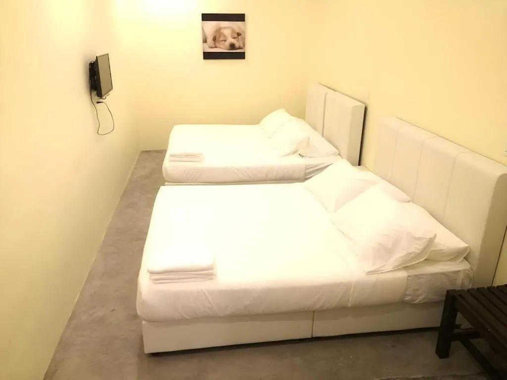 Bed in Hotel Pangkor Mutiara