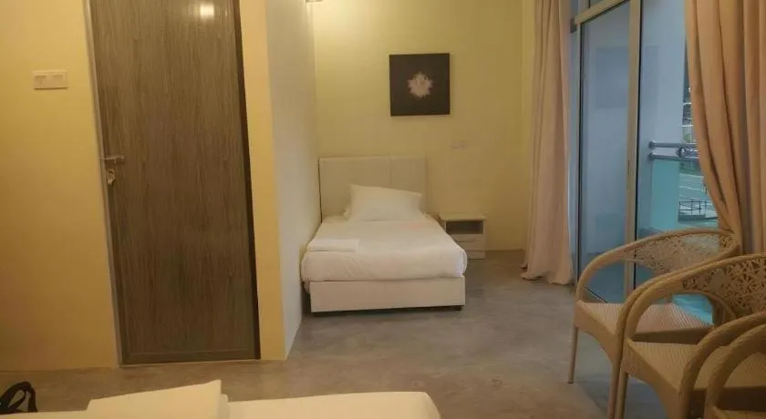 Bed in Hotel Pangkor Mutiara