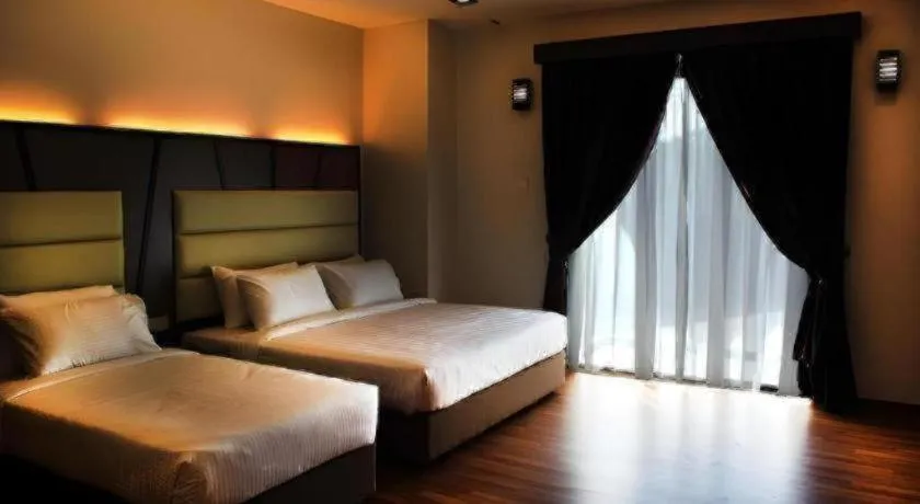 Bed in Hotel Grand Baron