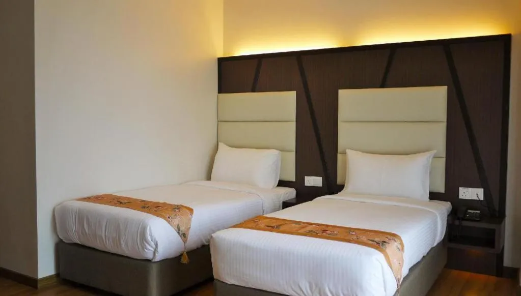 Bed in Hotel Grand Baron