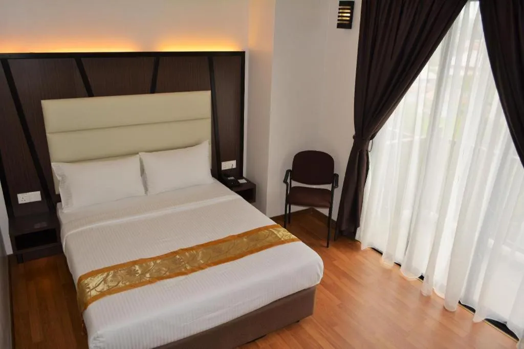 Bed in Hotel Grand Baron