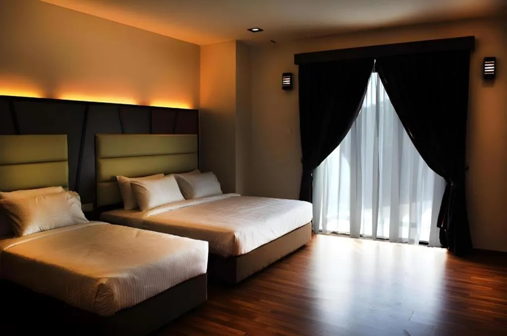 Bed in Hotel Grand Baron