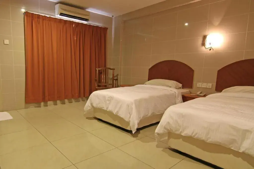 Bed in WW Hotel Ipoh Bed in WW Hotel Ipoh