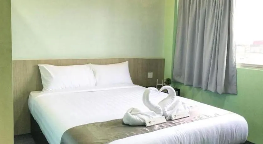 Bed in Kimal Hotel Taiping