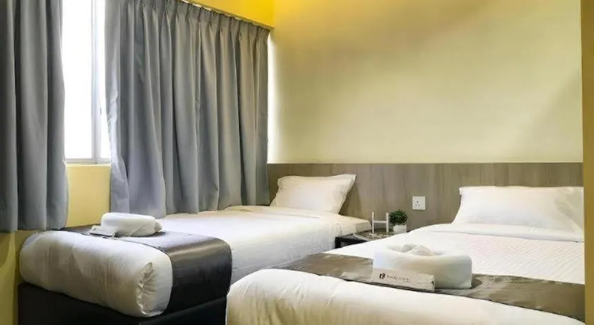 Bed in Kimal Hotel Taiping