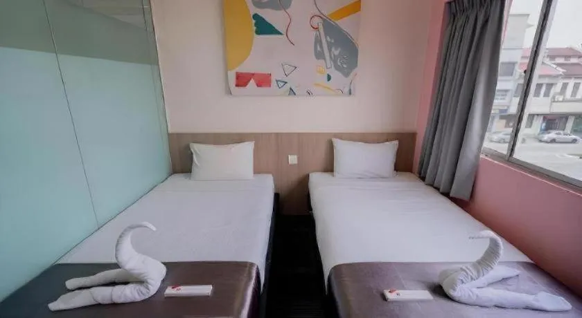 Bed in Kimal Hotel Taiping