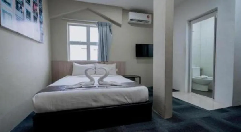 Bed in Kimal Hotel Taiping