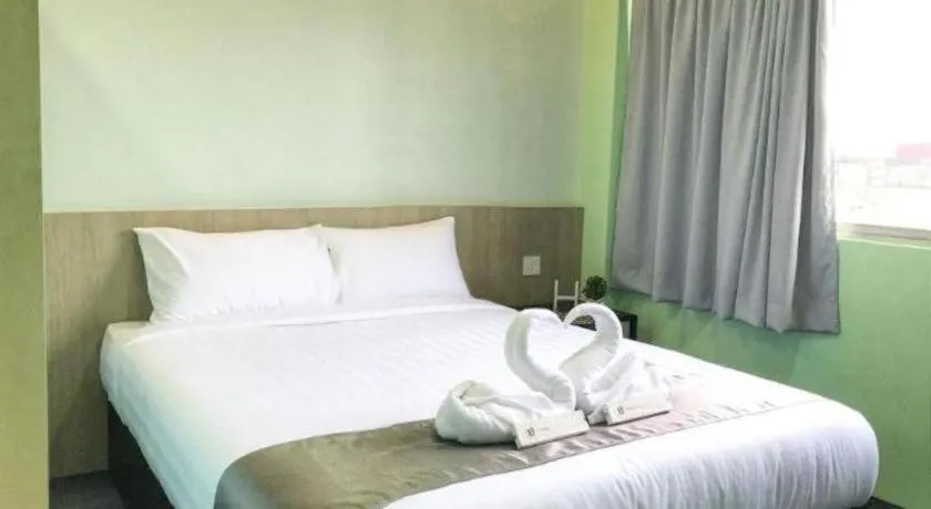 Bed in Kimal Hotel Taiping