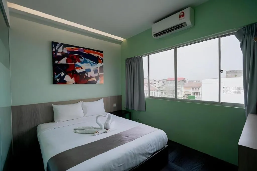 Bed in Kimal Hotel Taiping