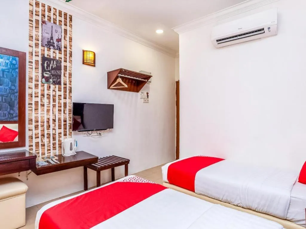 Bed in Super OYO 1114 Neo Pegasus Hotel