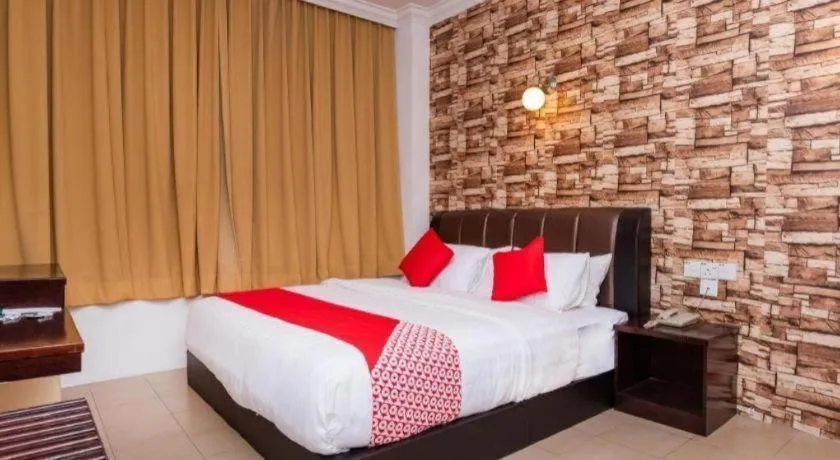 Bed in OYO 1114 Neo Pegasus Hotel