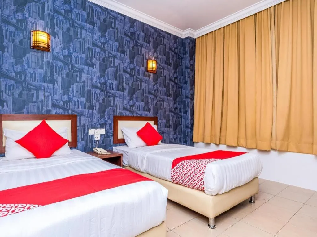 Bed in Super OYO 1114 Neo Pegasus Hotel