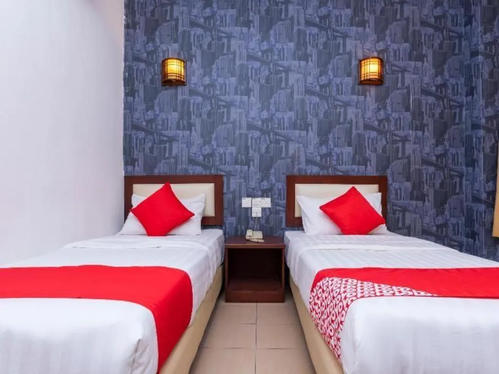 Bed in Super OYO 1114 Neo Pegasus Hotel