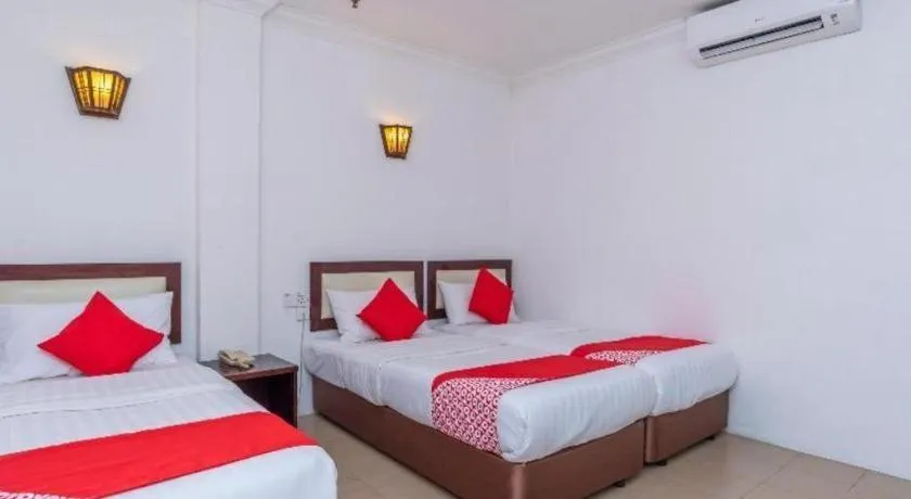 Bed in Super OYO 1114 Neo Pegasus Hotel