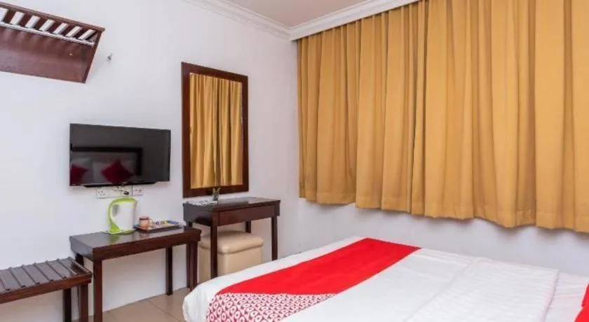 Bed in Super OYO 1114 Neo Pegasus Hotel