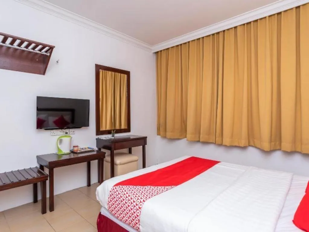 Bed in Super OYO 1114 Neo Pegasus Hotel