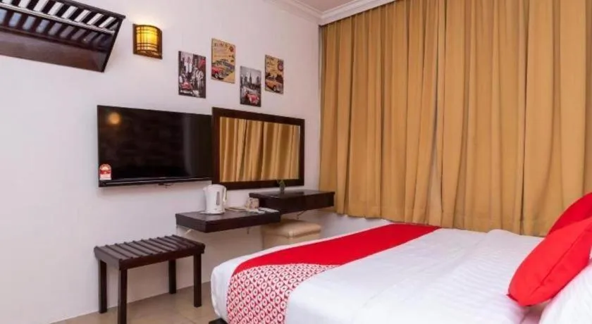 Bed in Super OYO 1114 Neo Pegasus Hotel