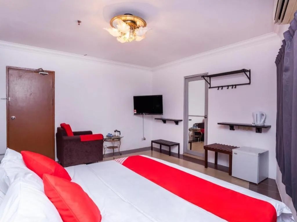 Bed in Super OYO 1114 Neo Pegasus Hotel