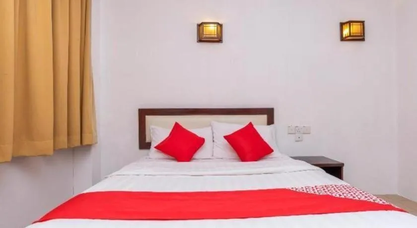 Bed in Super OYO 1114 Neo Pegasus Hotel