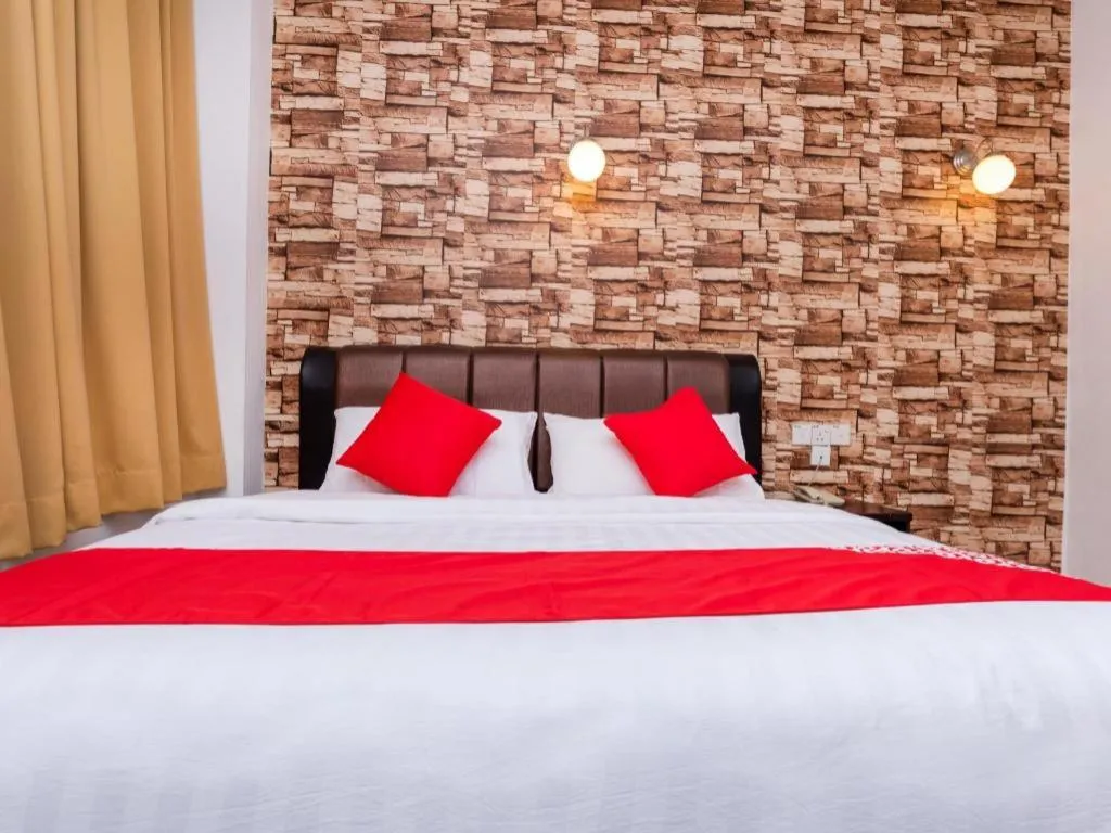 Bed in Super OYO 1114 Neo Pegasus Hotel