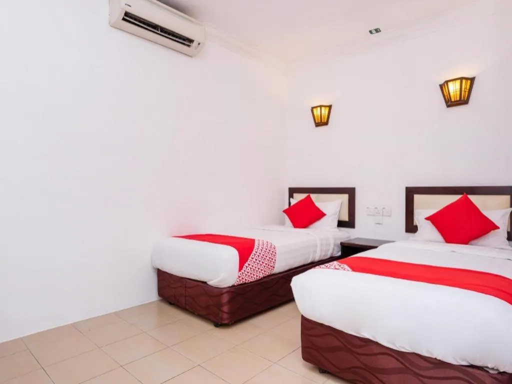 Bed in Super OYO 1114 Neo Pegasus Hotel