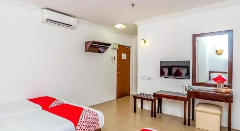 Bed in Super OYO 1114 Neo Pegasus Hotel