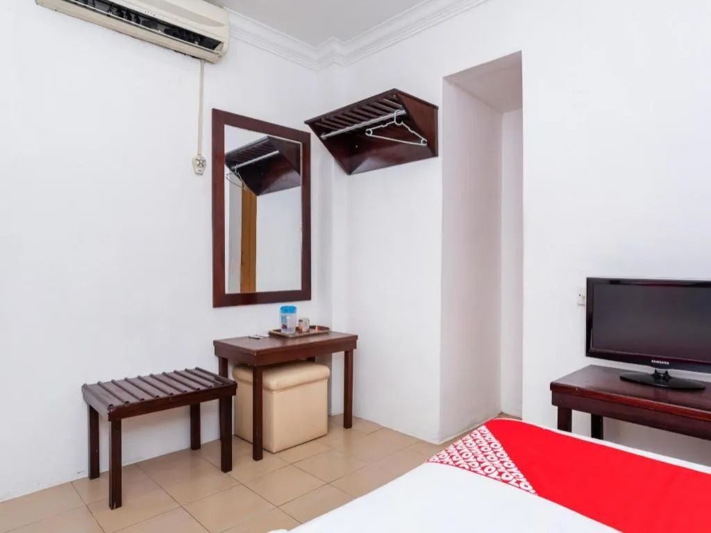 Bed in Super OYO 1114 Neo Pegasus Hotel