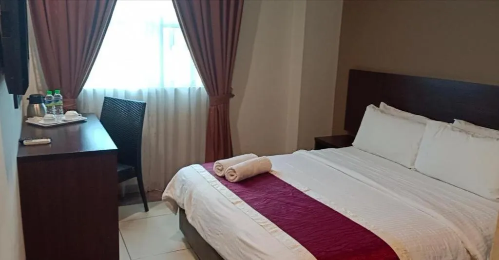 Bed in PPT Muar Hotel