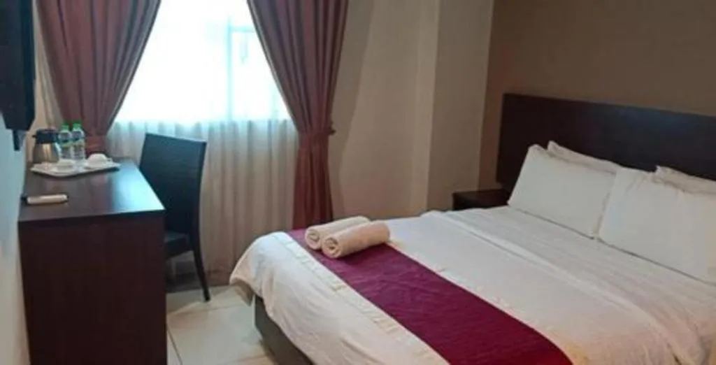 Bed in PPT Muar Hotel