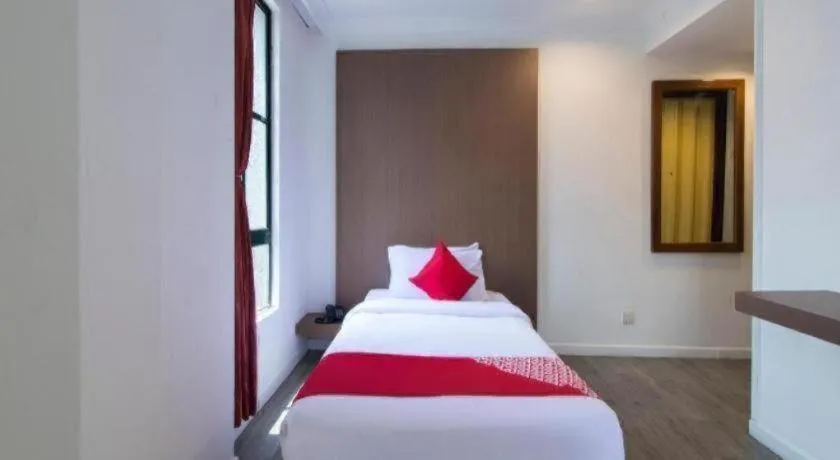 Bed in OYO 1045 Azimuth Hotel