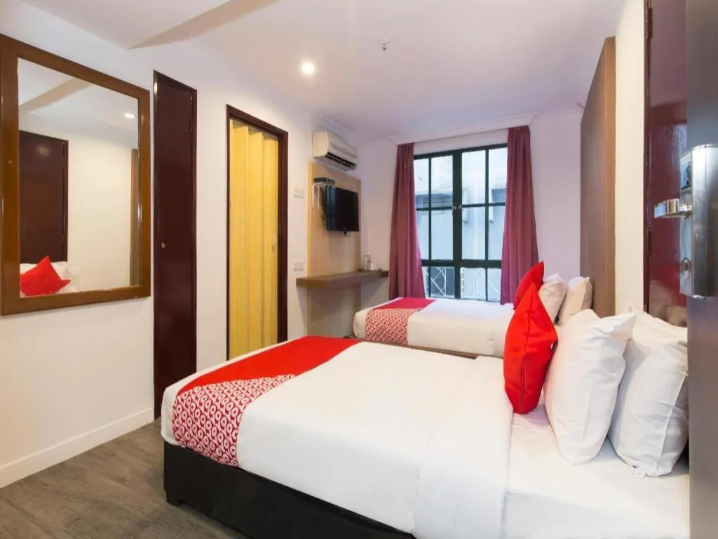 Bed in OYO 1045 Azimuth Hotel