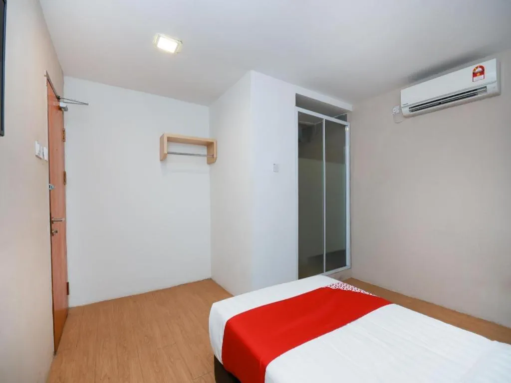 Bed in OYO 1111 Harmony Stay