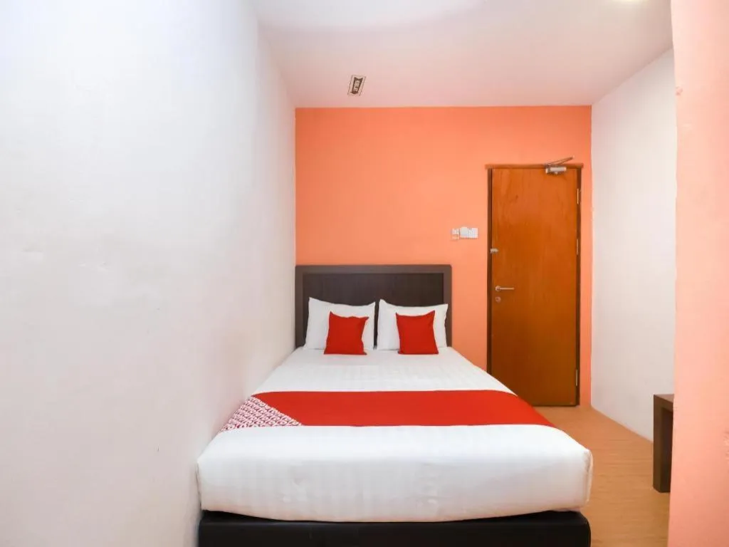 Bed in OYO 1111 Harmony Stay