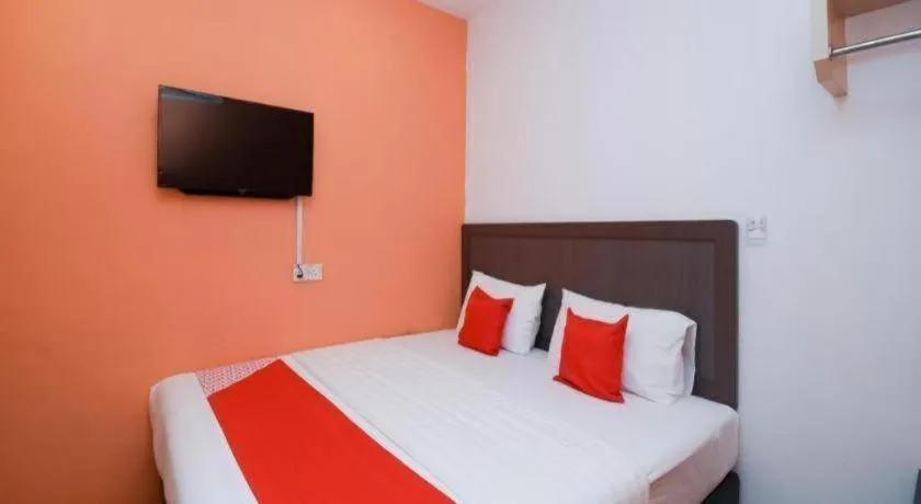 Bed in OYO 1111 Harmony Stay