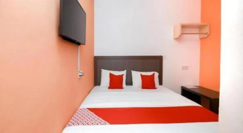 Bed in OYO 1111 Harmony Stay