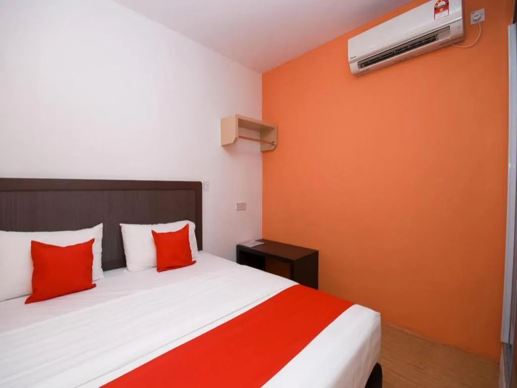 Bed in OYO 1111 Harmony Stay