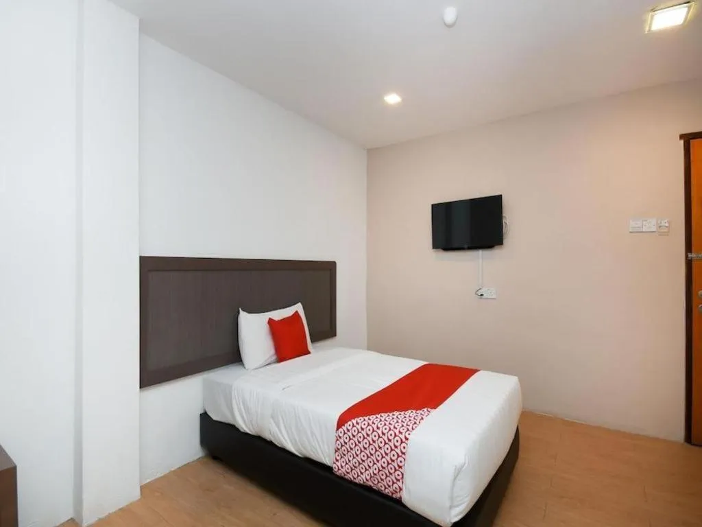 Bed in OYO 1111 Harmony Stay