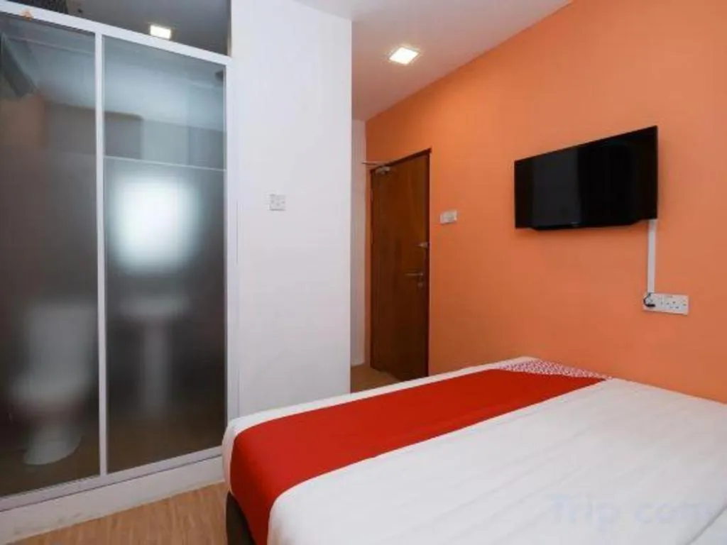 Bed in OYO 1111 Harmony Stay