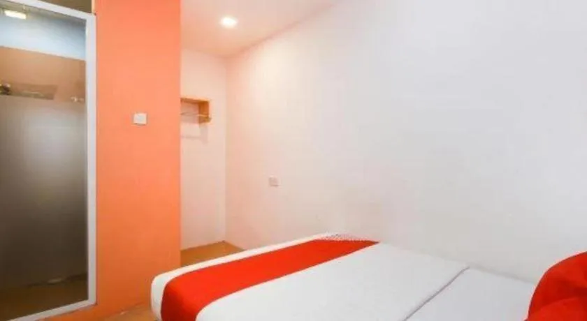 Bed in OYO 1111 Harmony Stay