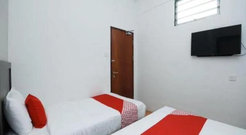 Bed in OYO 1111 Harmony Stay