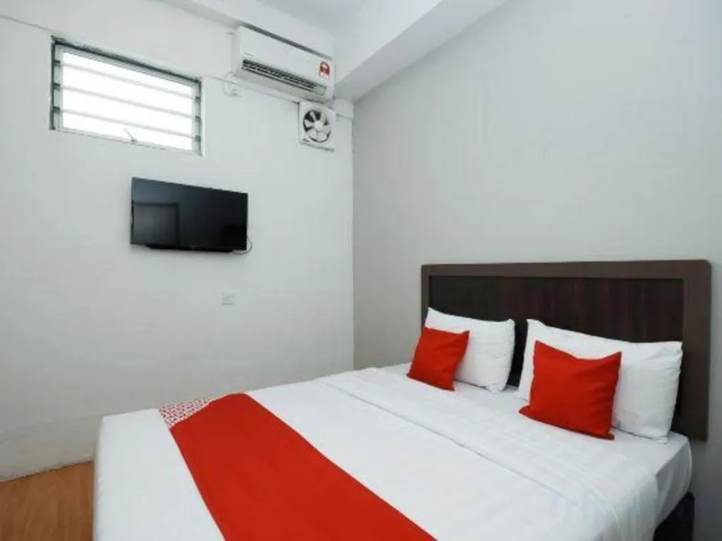 Bed in OYO 1111 Harmony Stay