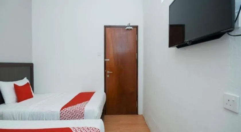 Bed in OYO 1111 Harmony Stay