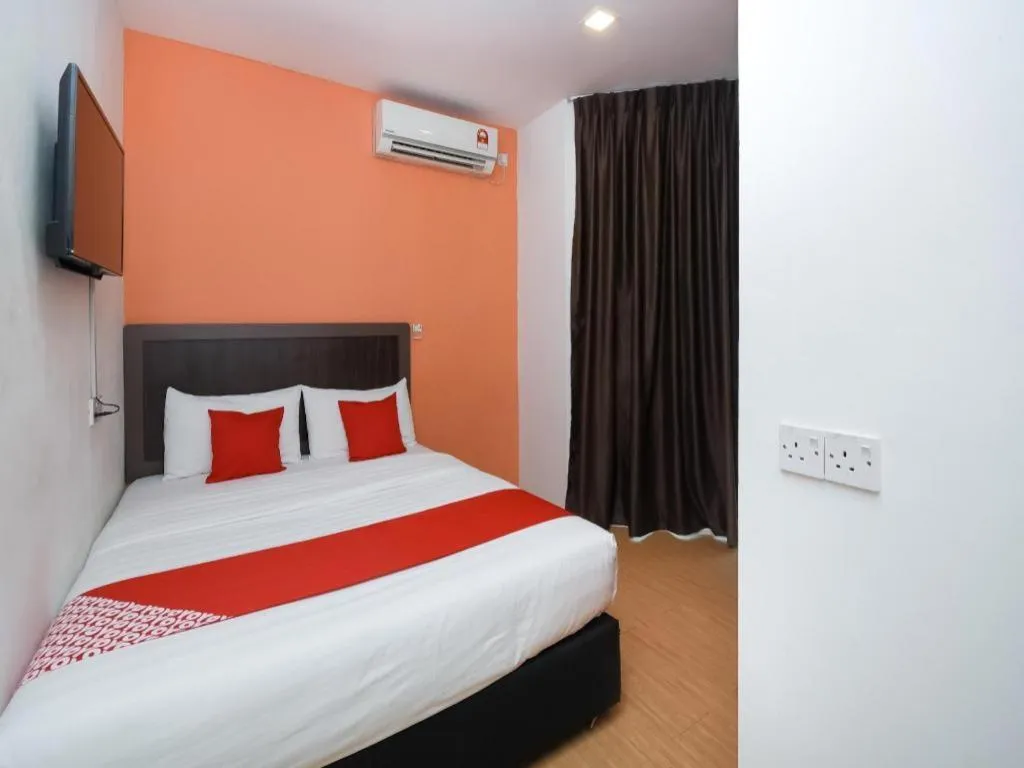 Bed in OYO 1111 Harmony Stay