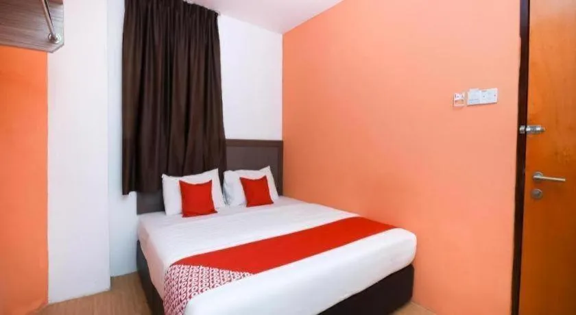 Bed in OYO 1111 Harmony Stay