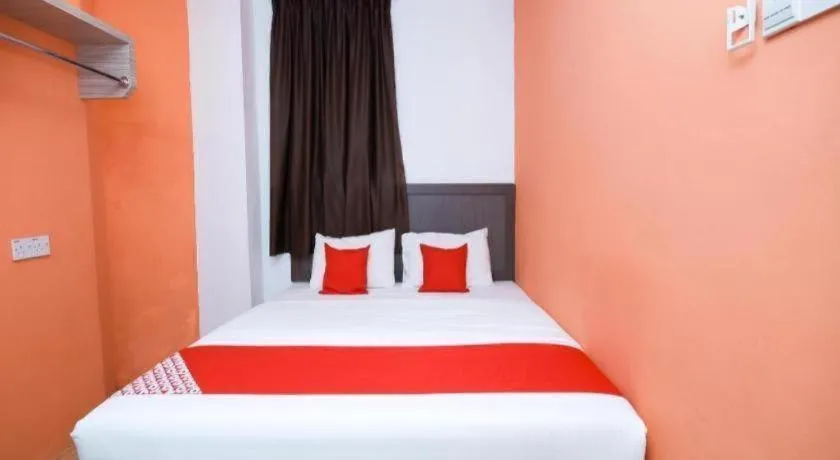 Bed in OYO 1111 Harmony Stay