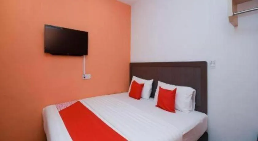 Bed in OYO 1111 Harmony Stay