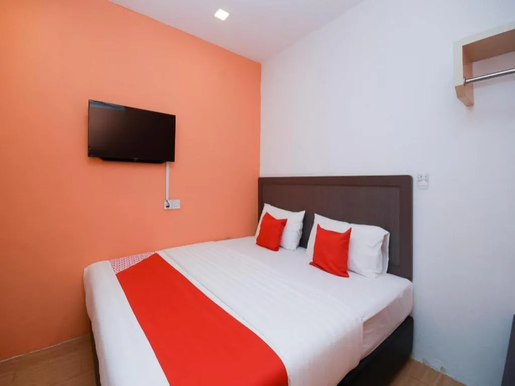 Bed in OYO 1111 Harmony Stay