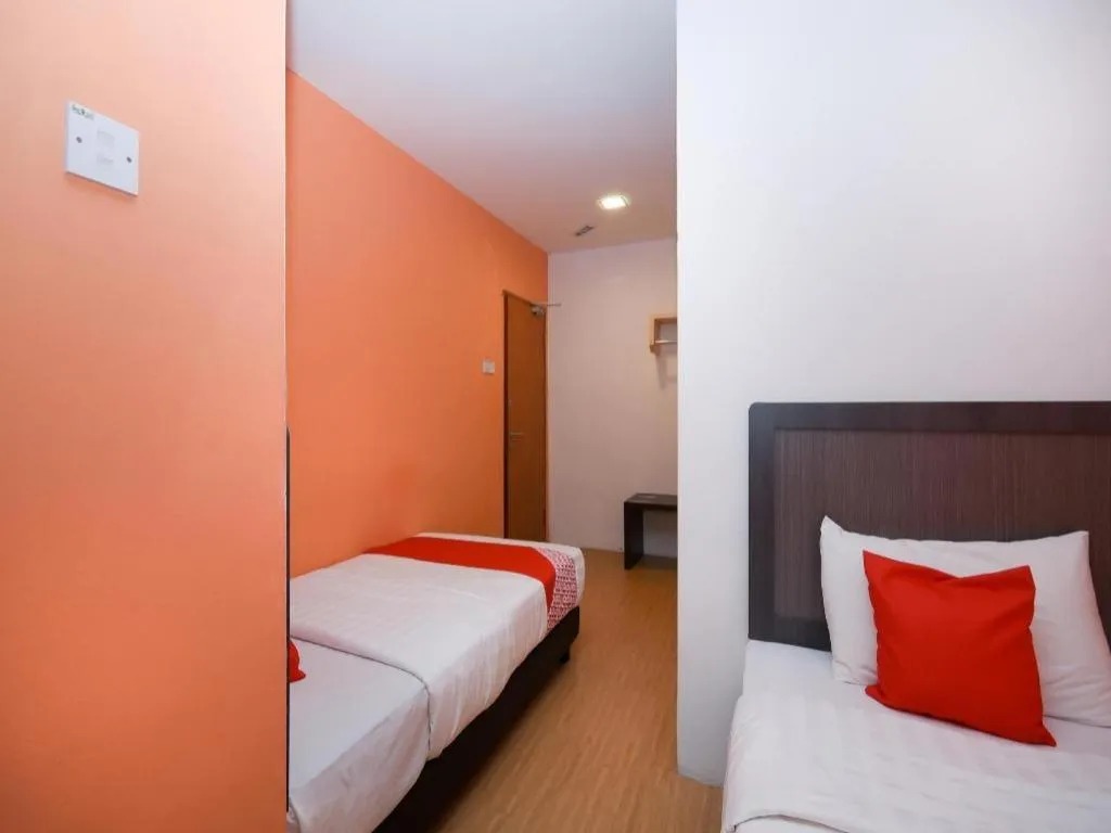 Bed in OYO 1111 Harmony Stay