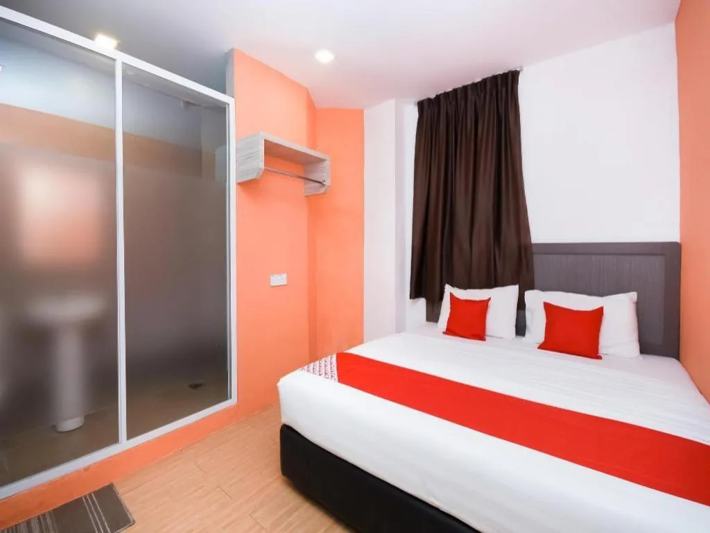 Bed in OYO 1111 Harmony Stay