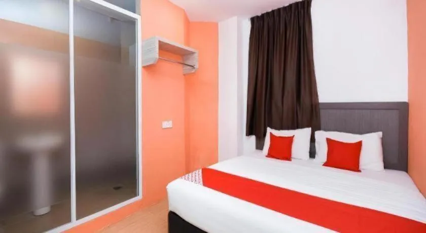 Bed in OYO 1111 Harmony Stay